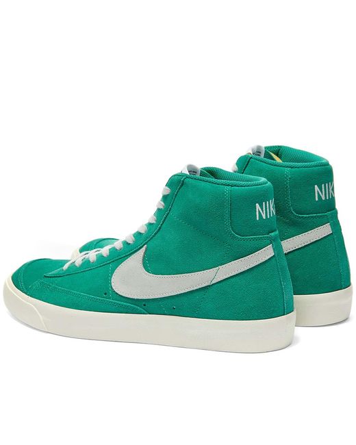 green nike blazers mid