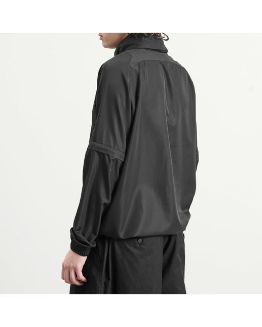 Umbro Black Zip Off Sleeve Wind Jacket for men