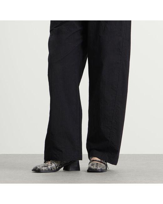 Justine Clenquet Black Andie Python Mules