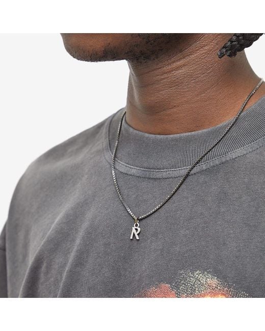 R outlet pendant silver