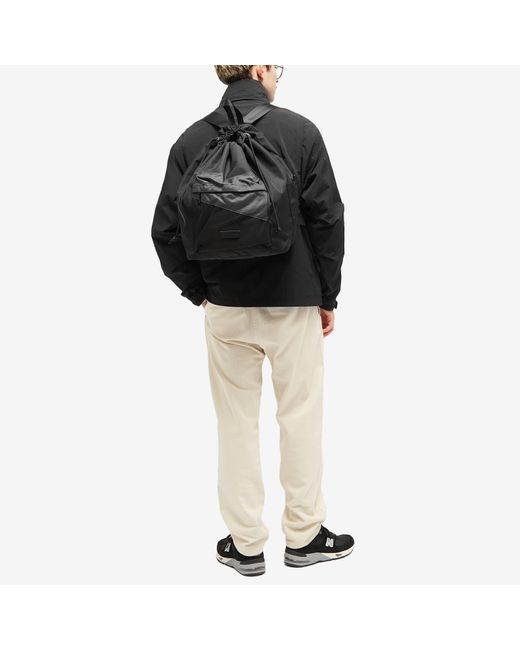 Master Piece Black Slant Drawstring Backpack for men