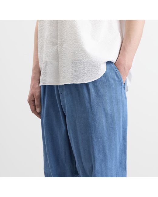Universal Works Blue Herringbone Rec. Pleated Track Pant for men