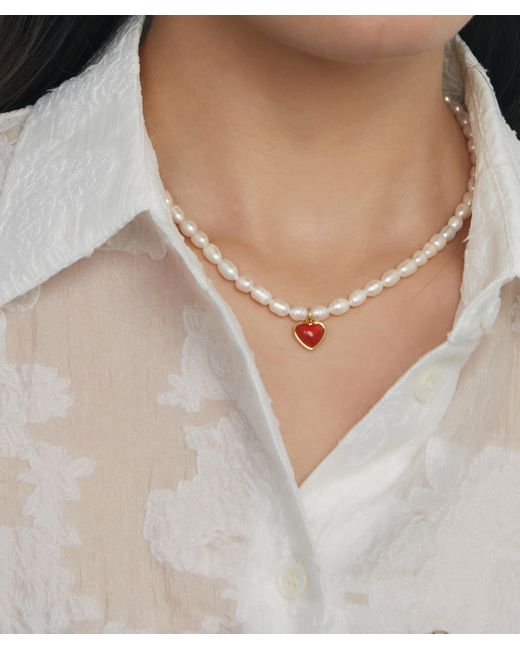 pearl necklace with stone pendant