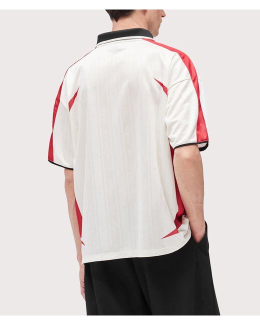 Represent Red Oversized Fit Spike Football Top for men