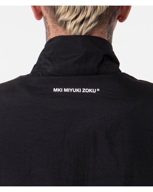 MKI Miyuki-Zoku Blue Oversized Crinkle Nylon Track Jacket for men