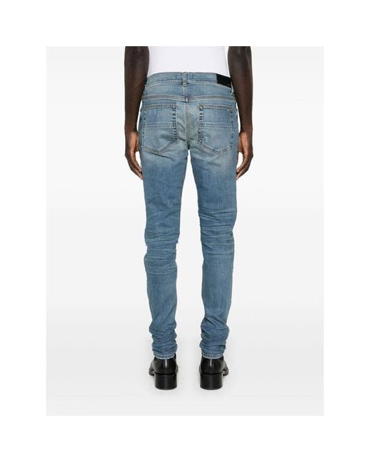 Amiri Blue Mx1 Distressed-Effect Skinny Jeans for men