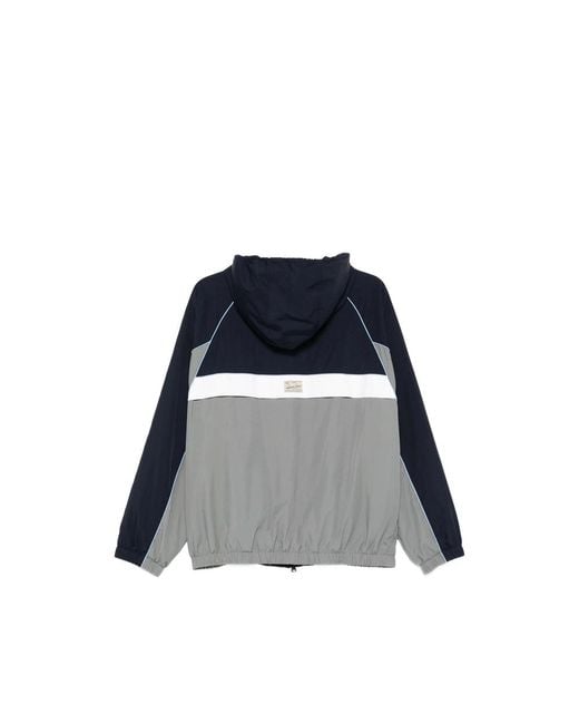 DUNST Blue Hooded Colourblock Windbreaker for men