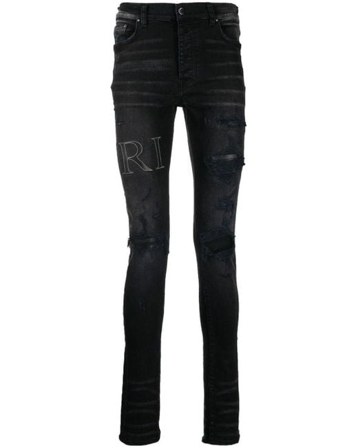Amiri Denim Logo-patch Slim-fit Jeans in Black for Men - Save 3% | Lyst ...