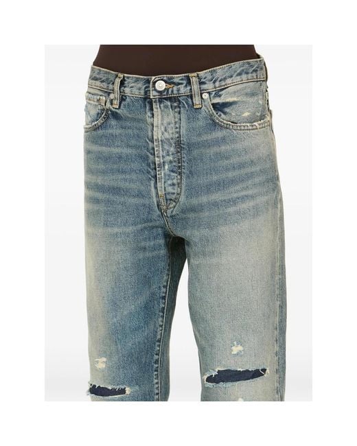 Maison Margiela Blue Distressed Patchwork Jeans for men