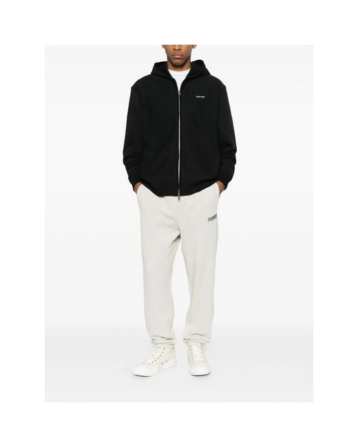 Calvin Klein White Logo-Patch Track Pants for men