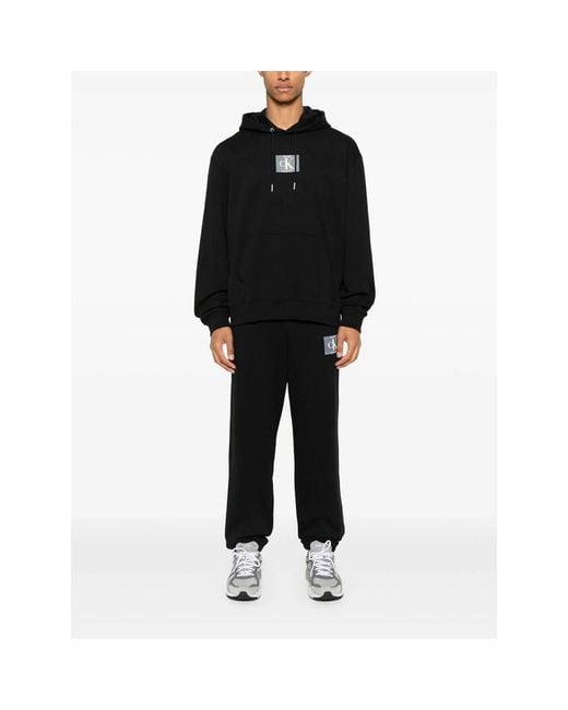 Calvin Klein Black Logo-Patch Track Pants for men