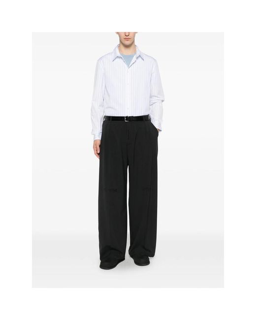 THESTROY Black Flat-Front Trousers