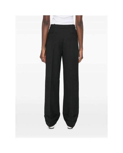 Stine Goya Black Pressed-Crease Buttoned-Cuff Trousers