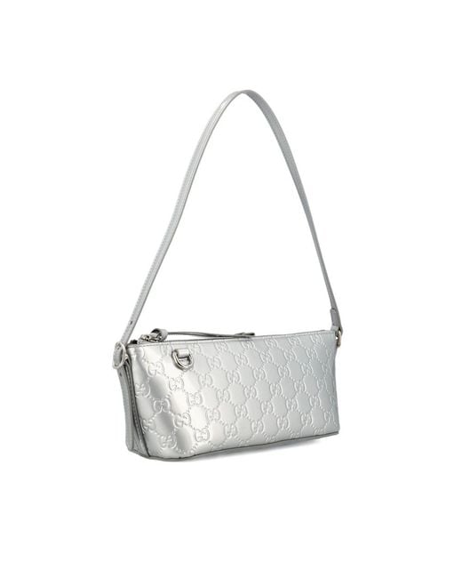 Gucci Metallic Gg Emblem Small Shoulder Bag