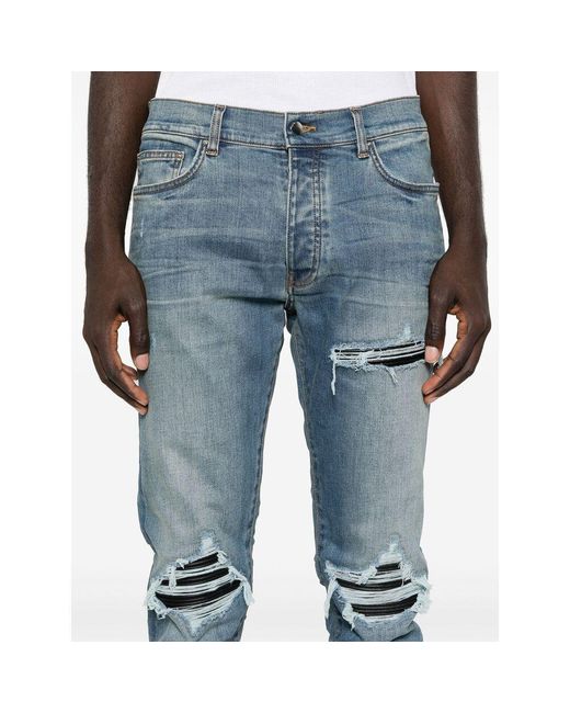 Amiri Blue Mx1 Distressed-Effect Skinny Jeans for men