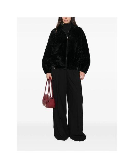 Simonetta Ravizza Black Strappy Buckle-Detail Fur Jacket