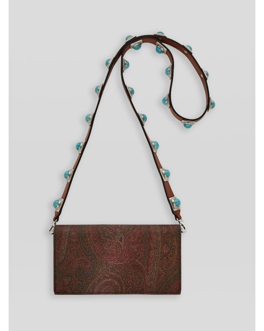 red leather purse strap