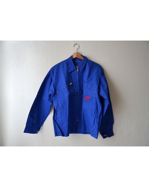 veste bleue de travail