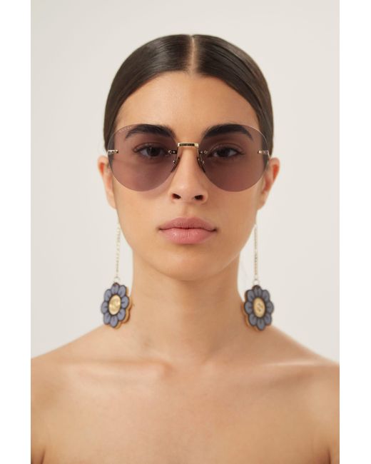 Gucci Chain Gold Round Sunglasses With Charms in Natural | Lyst