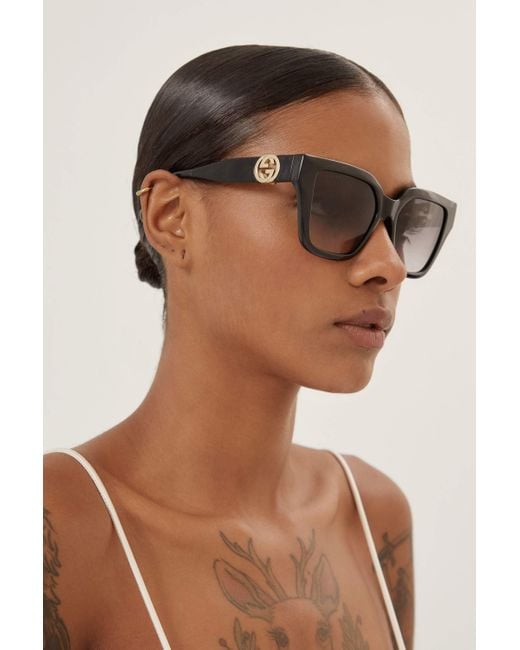 Gucci Pre Order Avail. November 23- Cat-eye Black Sunglasses With  Integrated GG Logo in Brown | Lyst