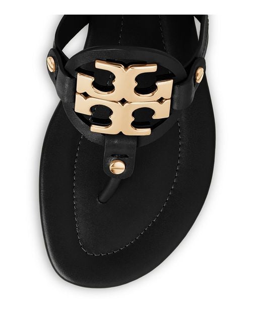 Tory burch black top and gold sandals