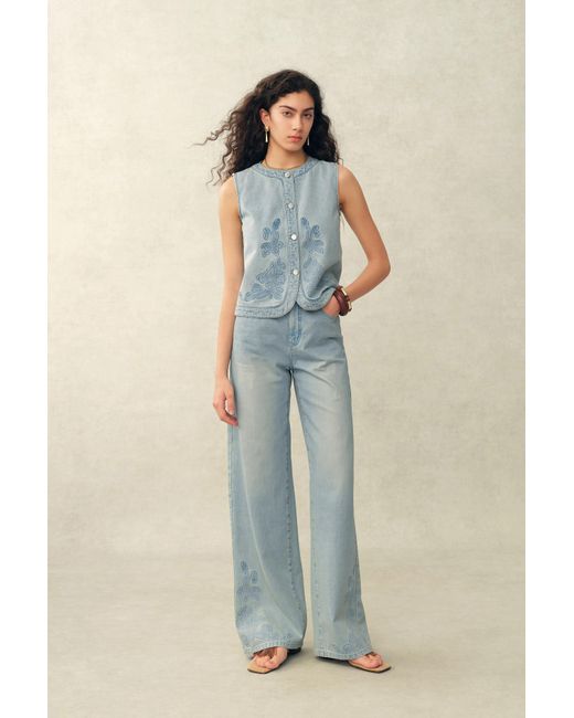 Fabrique Blue Perla Embossed Flowers Sleeveless Round Neck Top And Jeans Matching Set