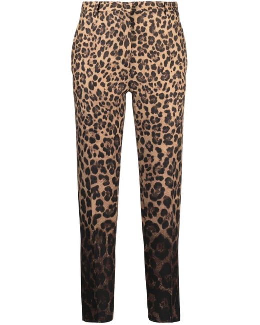 Pantalones slim con estampado de leopardo Valentino Garavani de color Natural