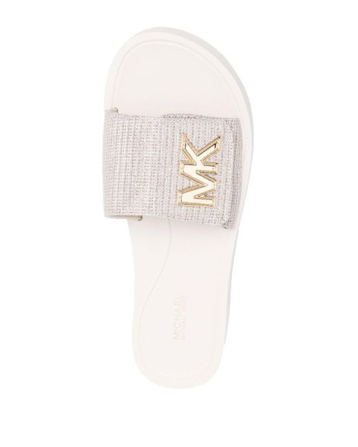 sandalias y chanclas de Sandalias planas Mujer Zapatos de Zapatos planos Sandalias con cadena y logo de MICHAEL Michael Kors de color Blanco 