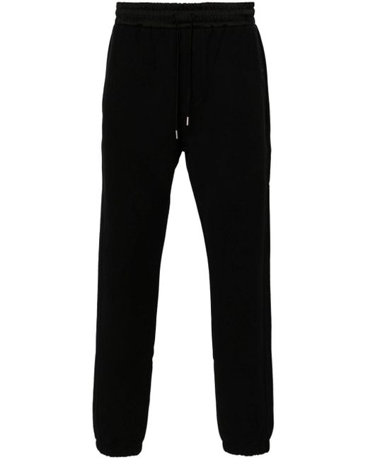 Pantaloni sportivi con ricamo di Saint Laurent in Black da Uomo