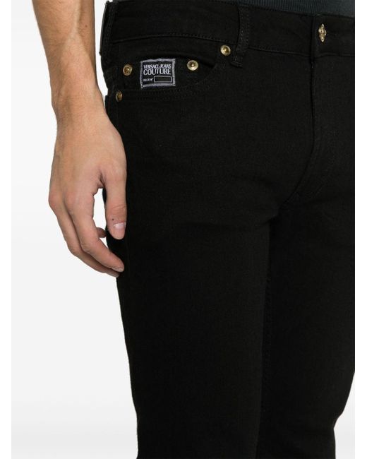 Versace Tief sitzende Skinny-Jeans in Black für Herren
