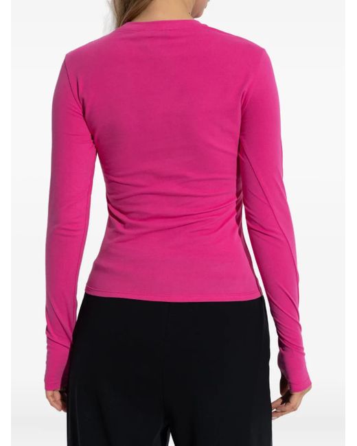 Top deportivo con detalle de abertura PANGAIA de color Pink