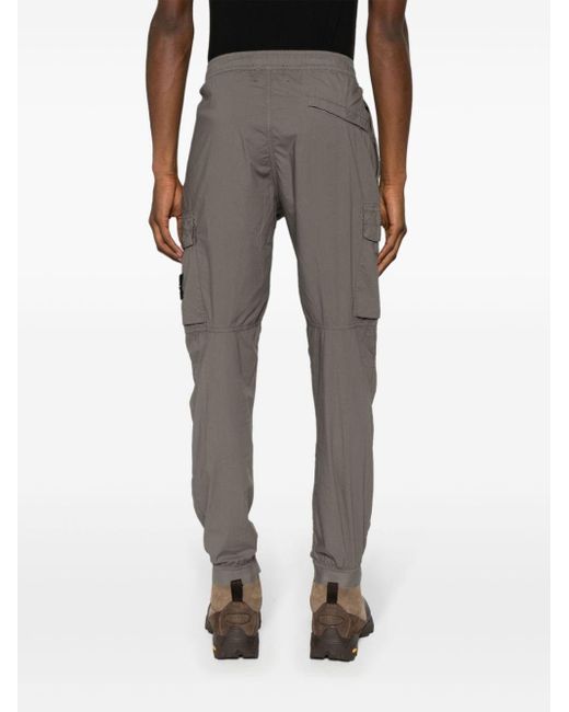 Pantalon de jogging à appliqué Compass Stone Island pour homme en coloris Gray