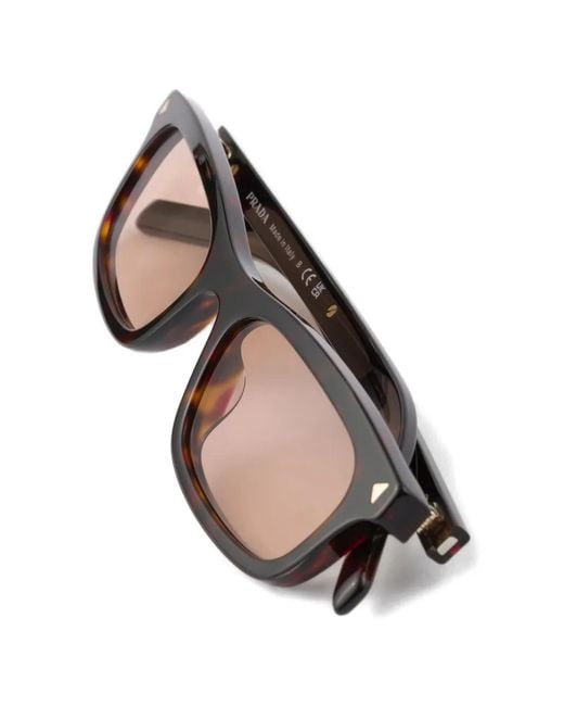 Prada Pink Sunglasses With The Iconic Metal Plaque