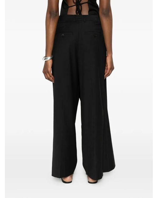 LA PISCINE Black Wrap Trousers