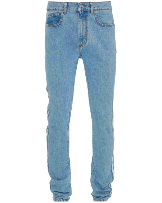 Jeans slim con applicazione di J.W. Anderson in Blue da Uomo
