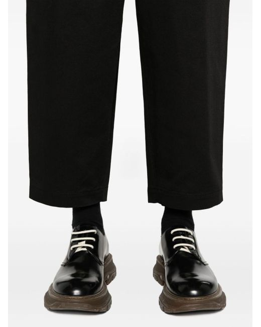 Pantaloni crop con pieghe di Comme des Garçons in Black da Uomo