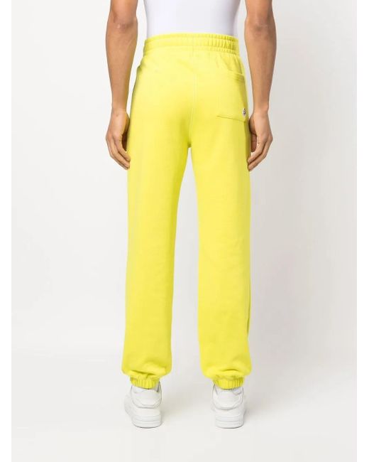 BBCICECREAM Yellow Arch Logo Track Pants for men