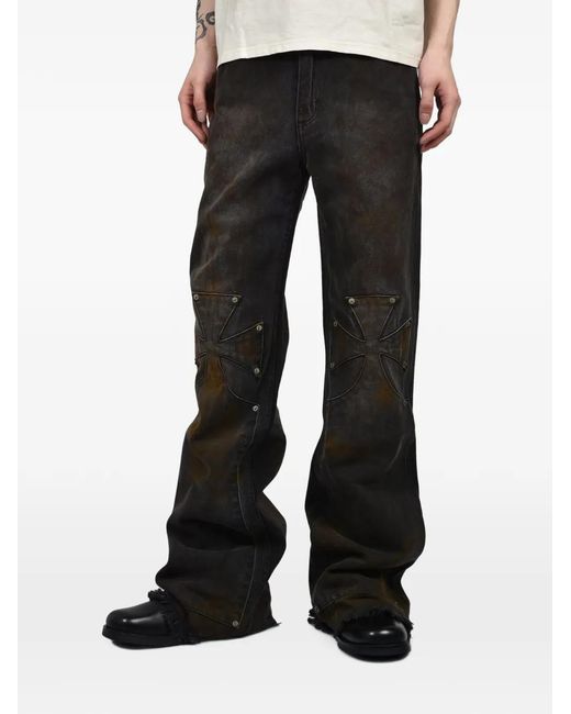 SEKRIT Black Cross-Patch Flared Jeans for men