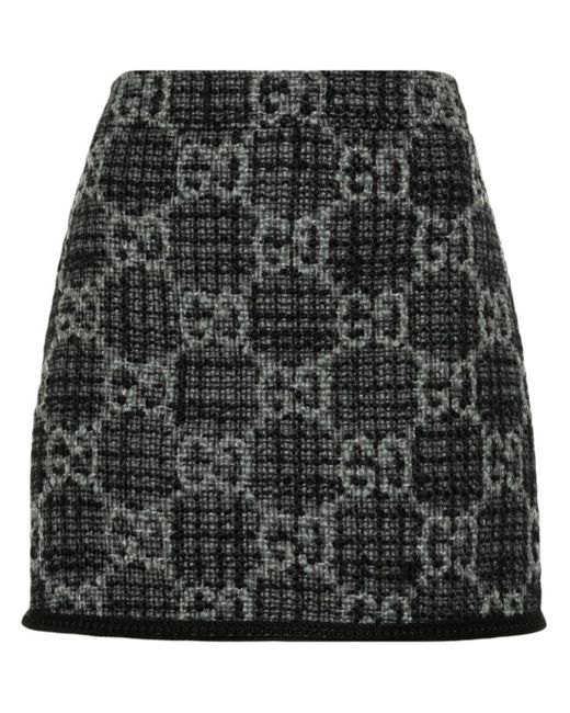 Robe courte en tweed à logo GG en jacquard Gucci en coloris Black