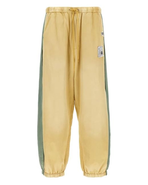 Maison Mihara Yasuhiro Yellow Aged Satin Track Pants for men