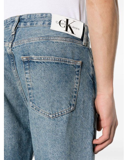 Jeans dritti a vita bassa di Calvin Klein in Blue da Uomo