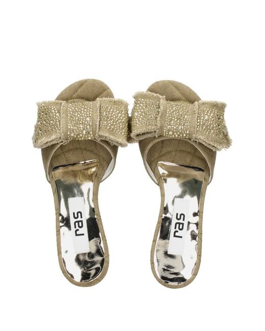 Stowers Ras Ras Bow-Embellished Sandals in Metallic | Lyst
