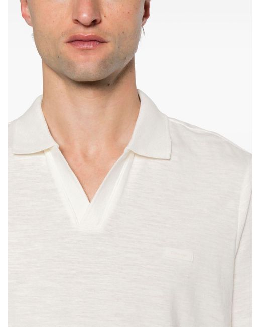 Polo à détail de logo Calvin Klein pour homme en coloris White