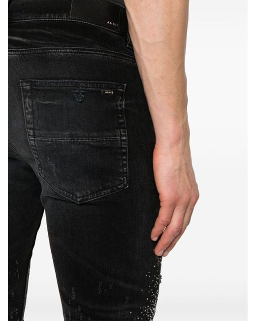 Jeans skinny Crystal Shotgun di Amiri in Black da Uomo