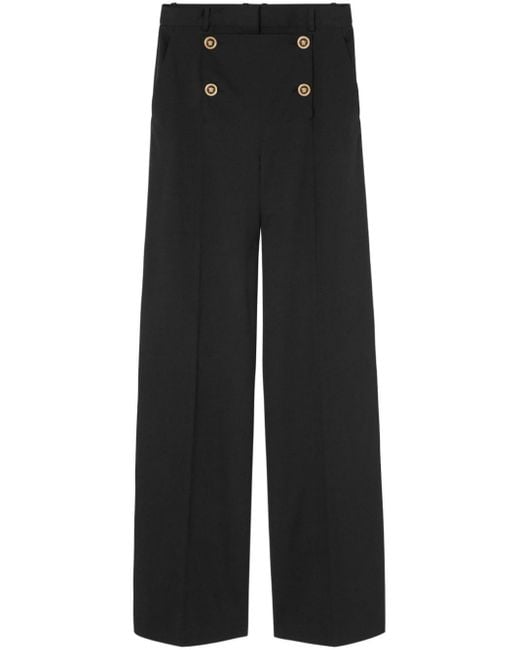 Pantalones anchos de talle alto Versace de color Black