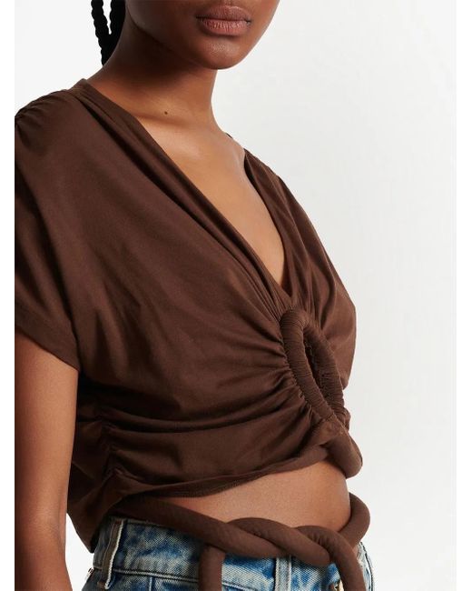 Top corto con detalle de nudo Balmain de color Brown