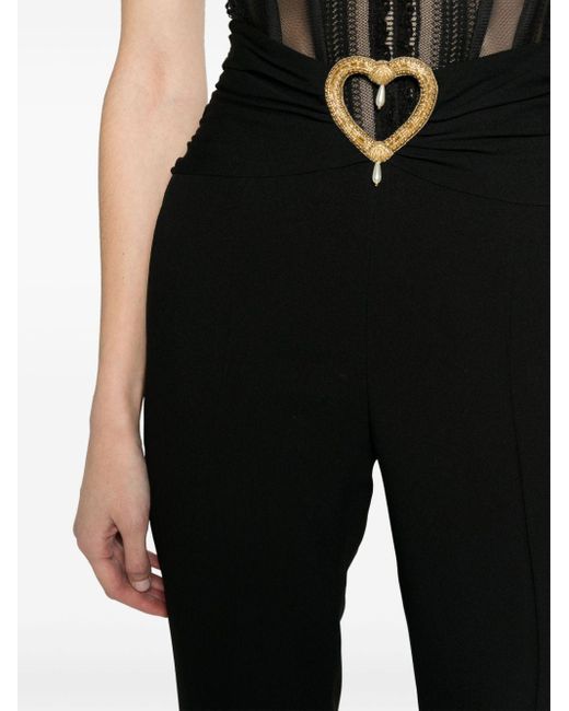 Pantalones de vestir con abertura en forma de corazón Moschino de color Black