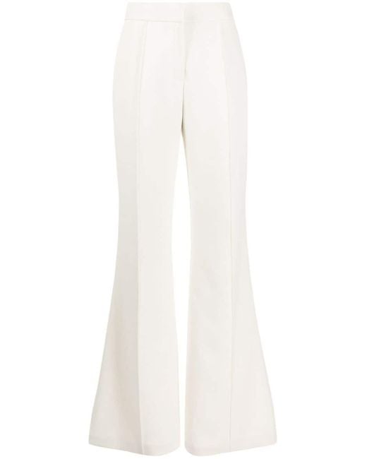 Pantalon évasé à plis marqués Elie Saab en coloris White