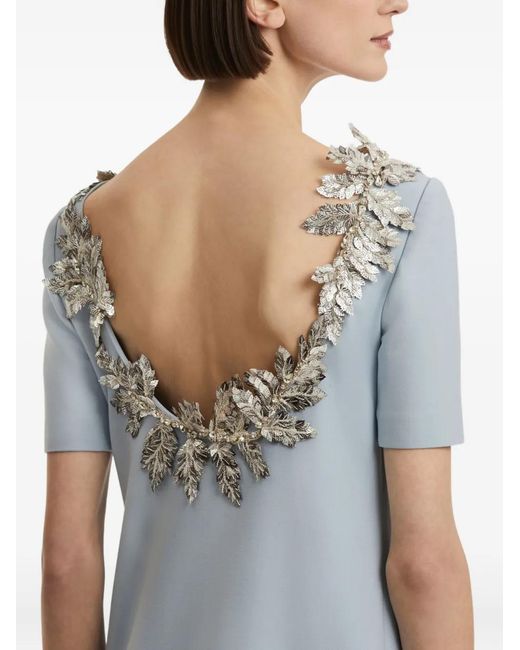 oscar de la renta open back dress A bridal reverie. The classic long-sleeve bridal gown is updated with all-over gardenia guipure and a dramatic open back. Discover the bridal collection at the link in bio