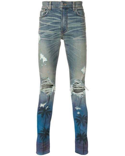 Amiri Blue Palm Tree Ripped Skinny Jeans for men